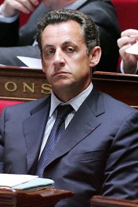 Sarkozy defends reforms against financial storm