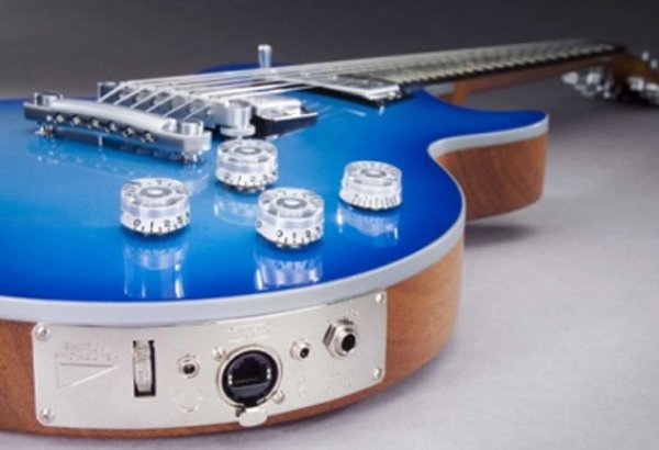 Con Lennonun və Corc Harrisonun gitarası 408 min dollara satılıb