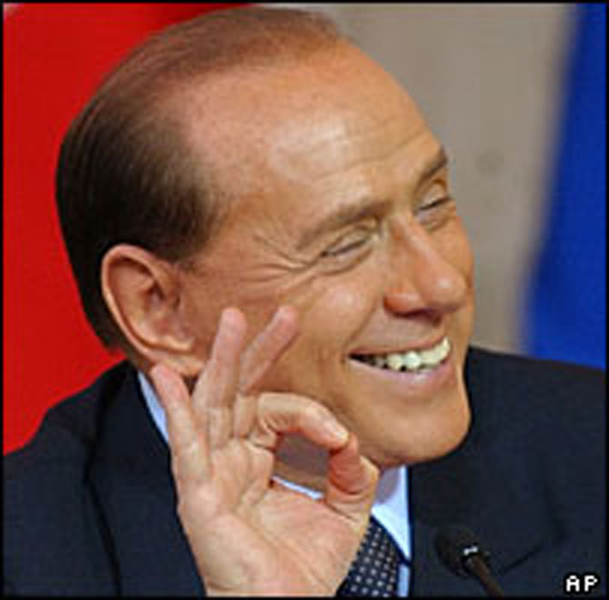 Silvio Berlusconi pretends to feel ill after tasting a buffalo mozzarella