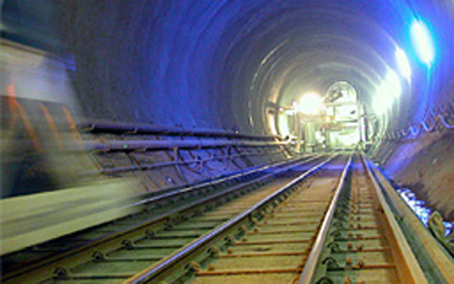 Swiss break through, creating world's longest tunnel