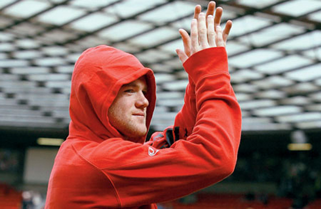 Rooney's stunning decision to stay at Man Utd gets mixed reaction