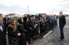President Ilham Aliyev opens new settlement for people from flood-hit areas (PHOTO)