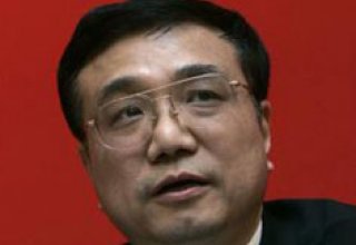 China's new premier promises to accelerate economic reform