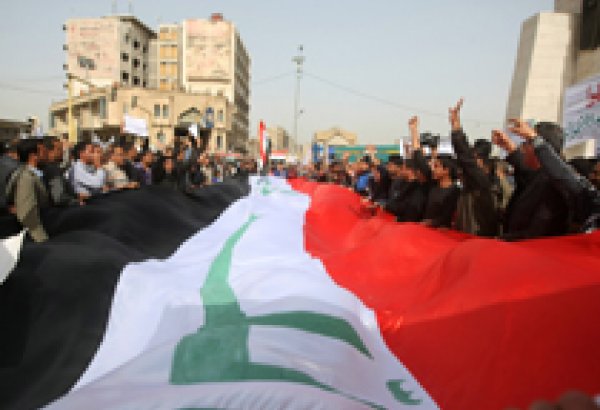Iraqi forces push protesters back to main square, kill five