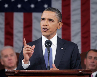 On caucus night, Obama tries to rally Democrats