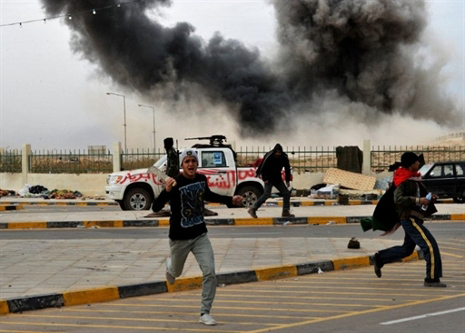 Report: Smoke seen in Tripoli, gunshots heard in Benghazi