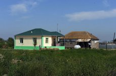 Azerbaijani president views new houses built for flood-affected villagers (PHOTOS)