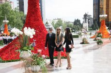 Azerbaijani President and his spouse join flower festival (PHOTOS)