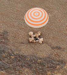 Soyuz space capsule lands in Kazakhstan