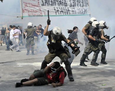 Greek police fire tear gas and clash with protesters