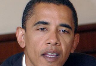 Обама призвал изменить закон об использовании оружия