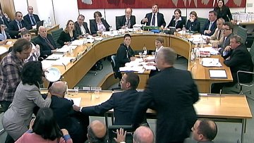Murdoch hit with "foam pie" at parliamentary hearing