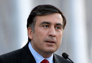 Georgian president says his party knocked down, but now it slowly rouses