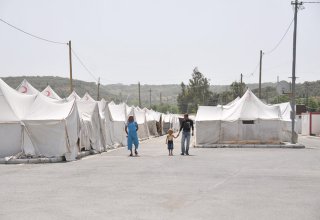 Palestinian group: Refugees returning to Damascus camp