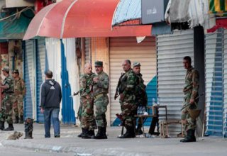 Syrian soldiers take shelter in Turkey as they escaped from opposition