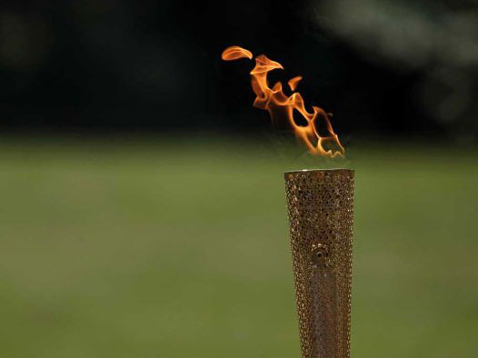 Олимпийский огонь доставлен из Греции в Японию