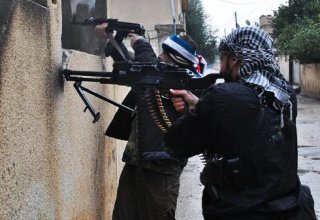 Syria rebels storm strategic border town