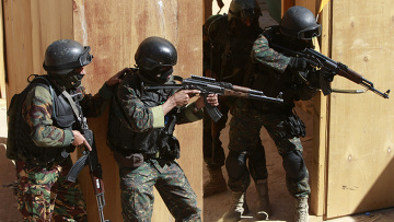 В Алматы началась интенсивная перестрелка между военными и вооруженными людьми