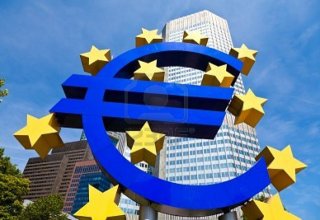 ECB is 'attentive' to exchange rate as euro hits parity with dollar