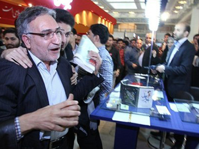 Appearance of Iranian film director at International Press Exhibition causes tensions