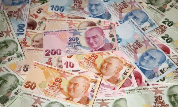 Turkish lira falls below record 2.1 against dollar under political pressure