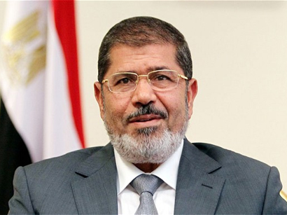 Məhəmməd Mursi misirliləri prezidentliyinin legitimliyini qorumağa çağırıb