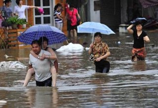 China issues blue alert for rainstorms
