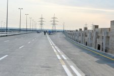 Azerbaijani President attends opening of highway to Qala residential area (PHOTO)