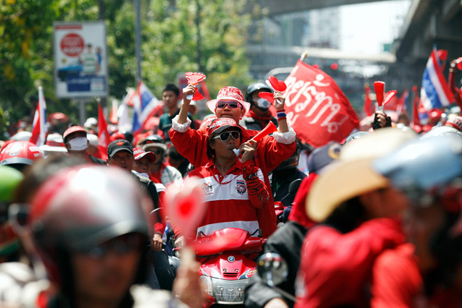 Thai protesters swarm telecommunications agencies