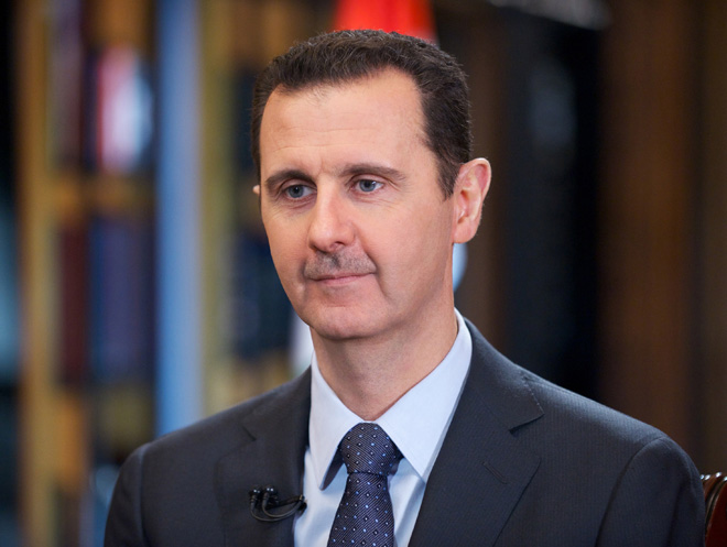 Assad says Syria to push reconciliation and halt bloodshed