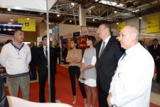 Azerbaijani president and his spouse attend exhibitions in Baku (PHOTO)