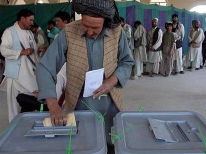 Afghan presidential election heads for a run-off in June