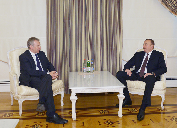 Azerbaijani president receives former Belgian PM