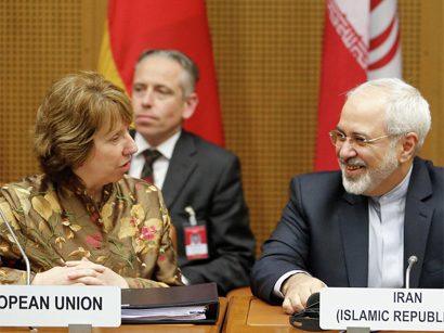 U.S. urges "additional realism" as Iran talks hit slowdown