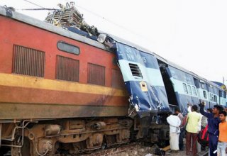 Train crash in northern India kills at least 40, many trapped