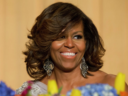 Michelle Obama wants a woman president "as soon as possible"