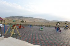 Azerbaijani president reviews 25 newly-built private houses in Khizi