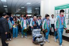 Azərbaycanın Olimpiya medalçıları Vətənə qayıdıb (FOTO)