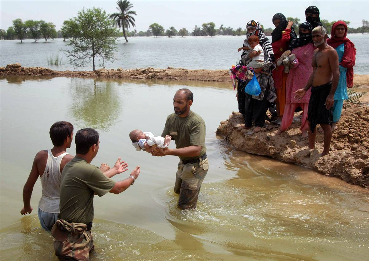 Pakistan, India floods kill at least 236