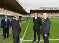 İlham Əliyev Masazır qəsəbəsində inşa olunan stadionun açılışında iştirak edib (FOTO)
