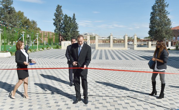 Azerbaijani president attends opening of secondary school block in Ganja (PHOTO)