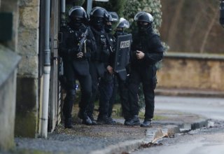 French police kill two terror suspects, two others surrounded