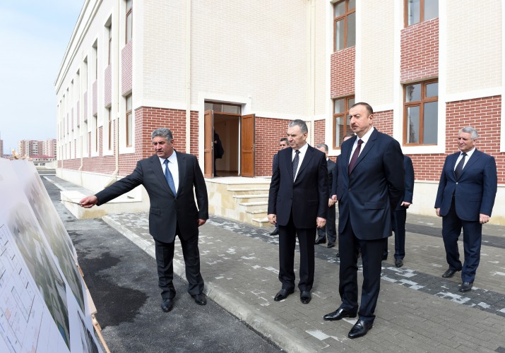 President Ilham Aliyev reviews newly-built residential complex for IDP families in Mingachevir