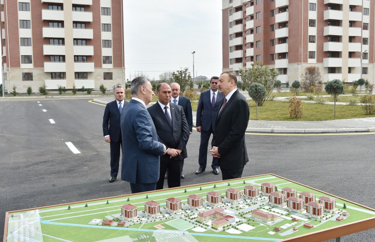 President Ilham Aliyev reviews newly-built residential complex for IDP families in Barda