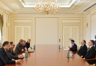 Ilham Aliyev receives European commissioner for neighborhood policy and enlargement negotiations