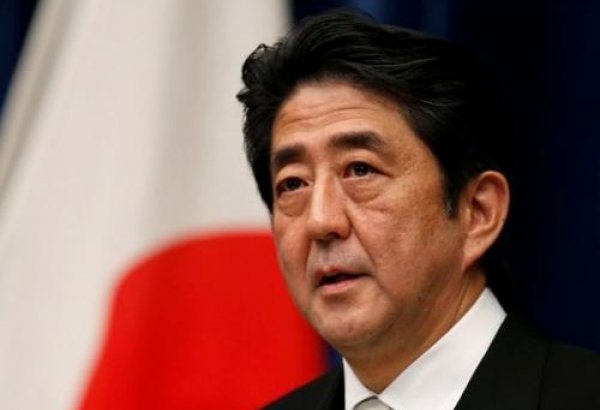 Japan PM Abe calls for strong G20 message on free trade