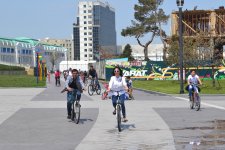 Youth pushing pedals on Baku Boulevard on eve of European Games