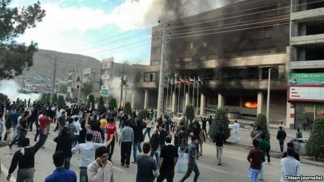 Protesters set fire to hotel in Iran over death of female worker