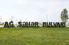 Ilham Aliyev, his spouse review Baku White City boulevard