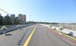 Ilham Aliyev attends opening of bridge and road in Baku (PHOTO)